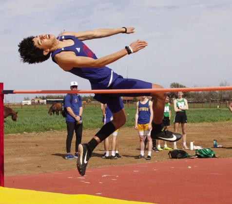 Joe Adam Morelos clears the bar at the high jump. | SHERI BATY PHOTO